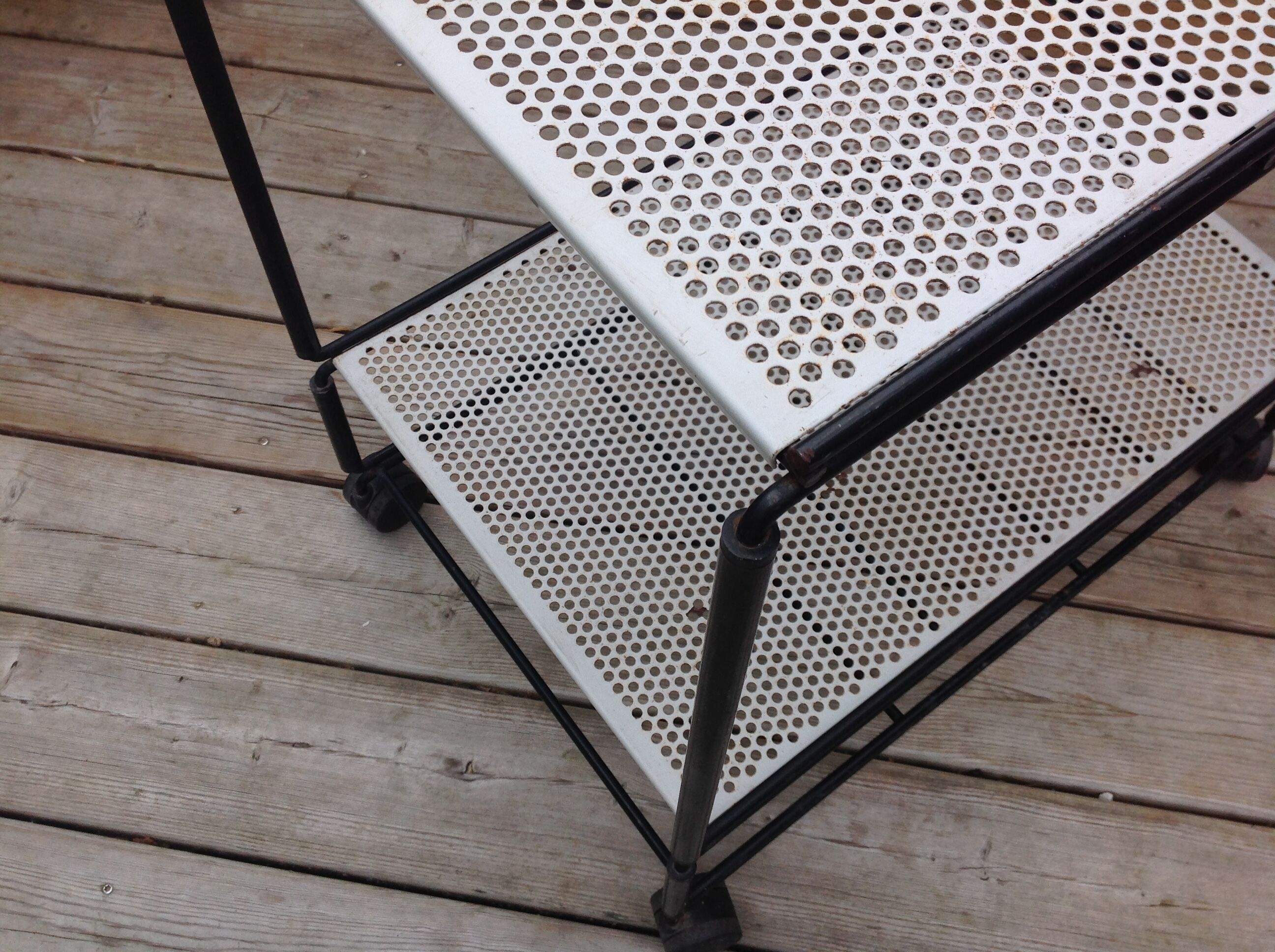 Perforated iron rolling table