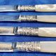 4 antique butter spreading knives in silver-plated metal and mother-of-pearl.