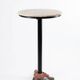 Bistro standing table with marble top and cast iron base.
