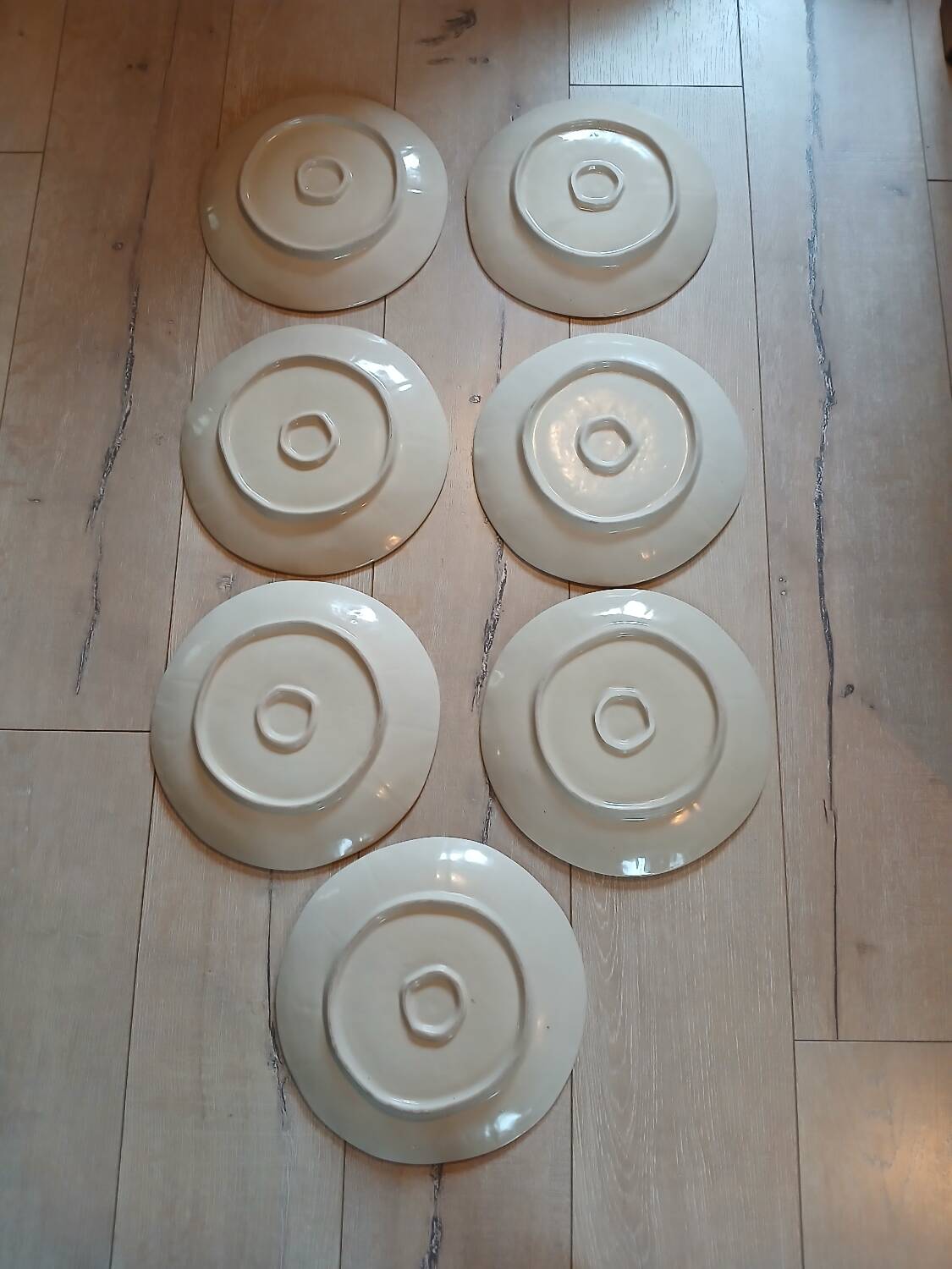 7 old stoneware flat plates