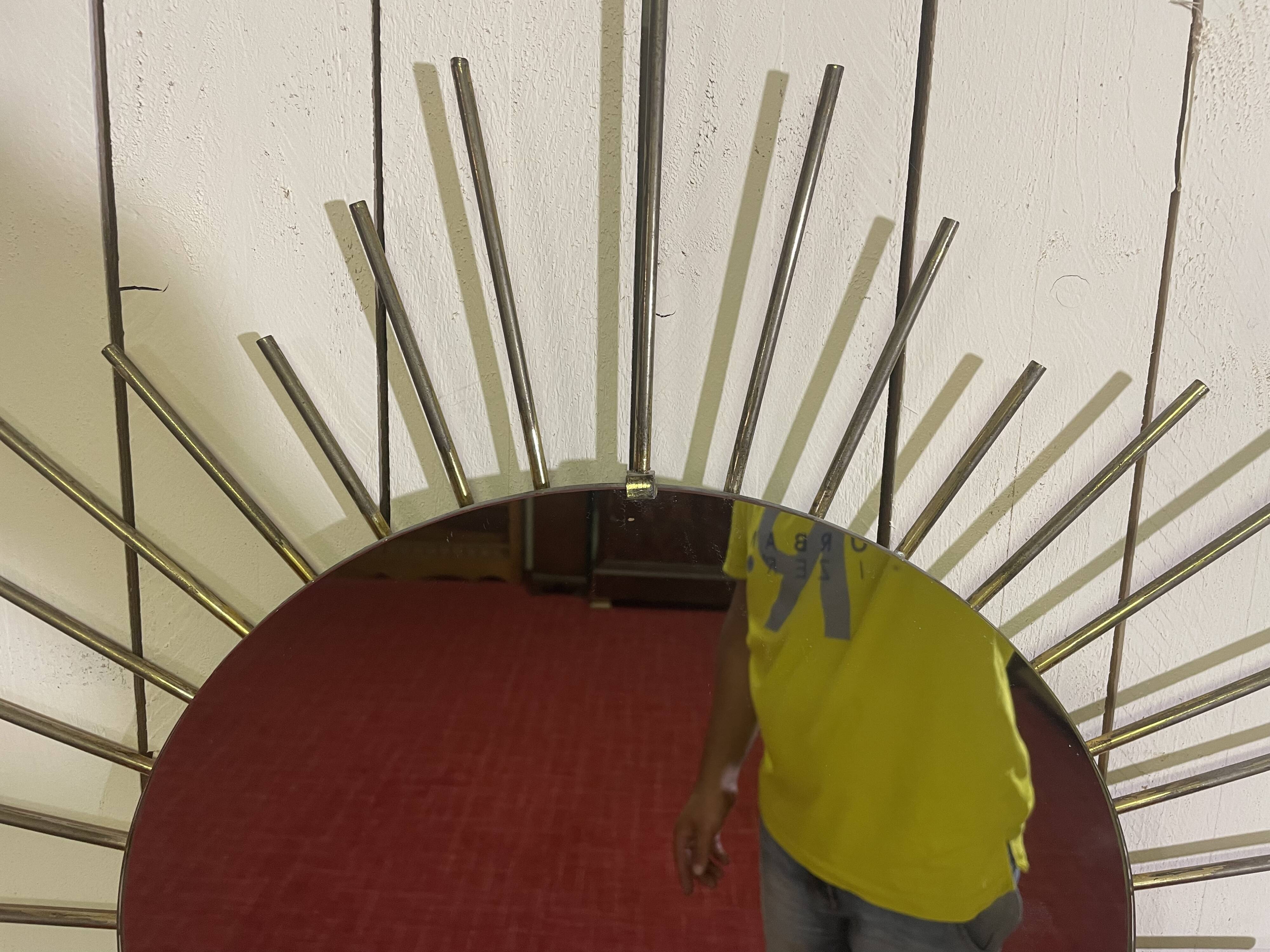 Golden metal sun mirror year 60