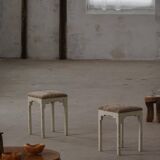 A pair of antique Danish stools, seats in lambswool, late 19th century.