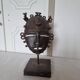 African bronze mask on pedestal, from Ivory Coast, dating