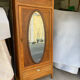 Art Deco wardrobe with oval mirror