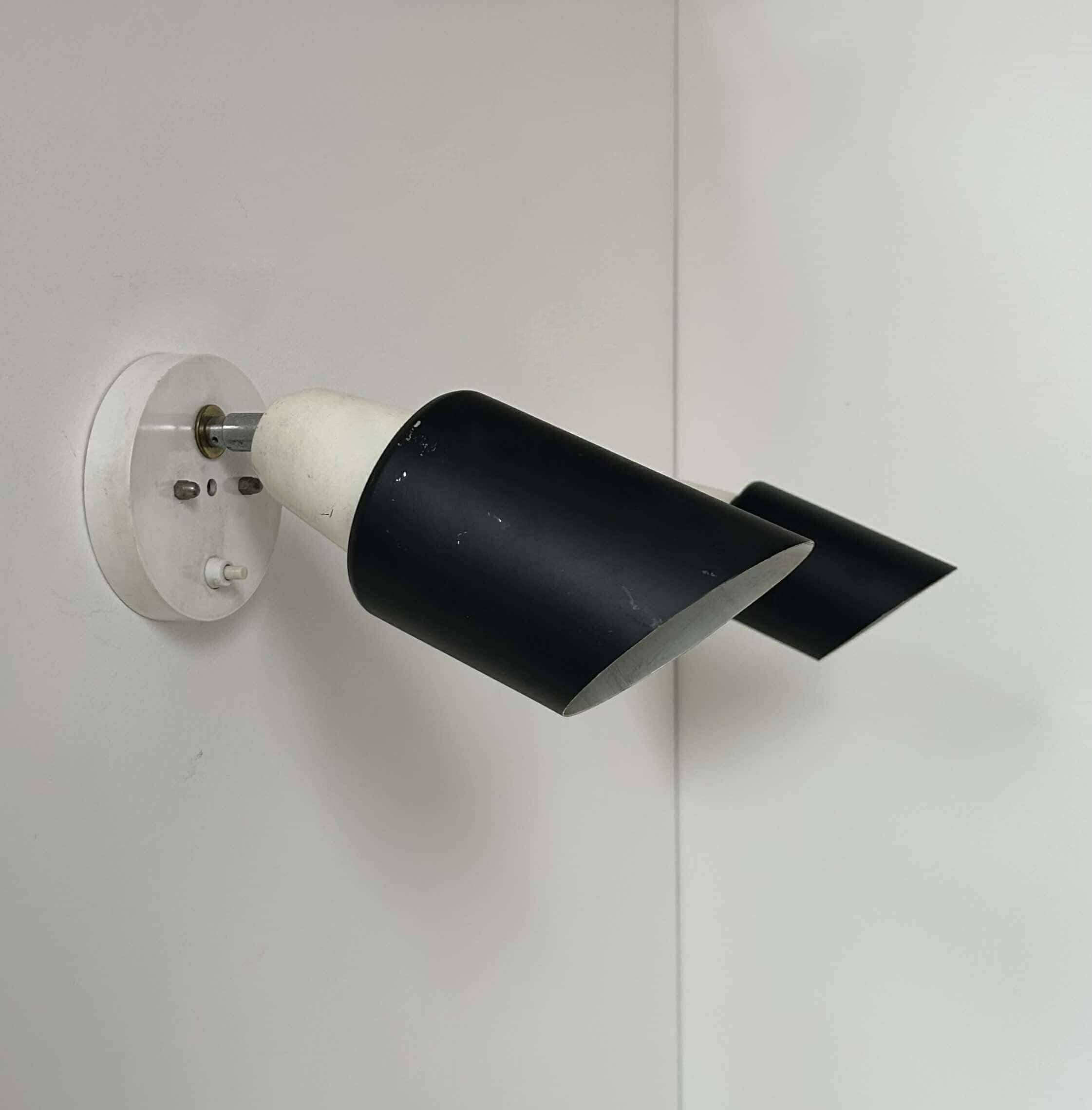 Pair of vintage adjustable wall lights, black and white, Raak Netherlands 1970