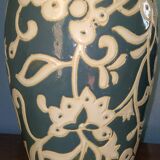 Blue water vase with white floral pattern