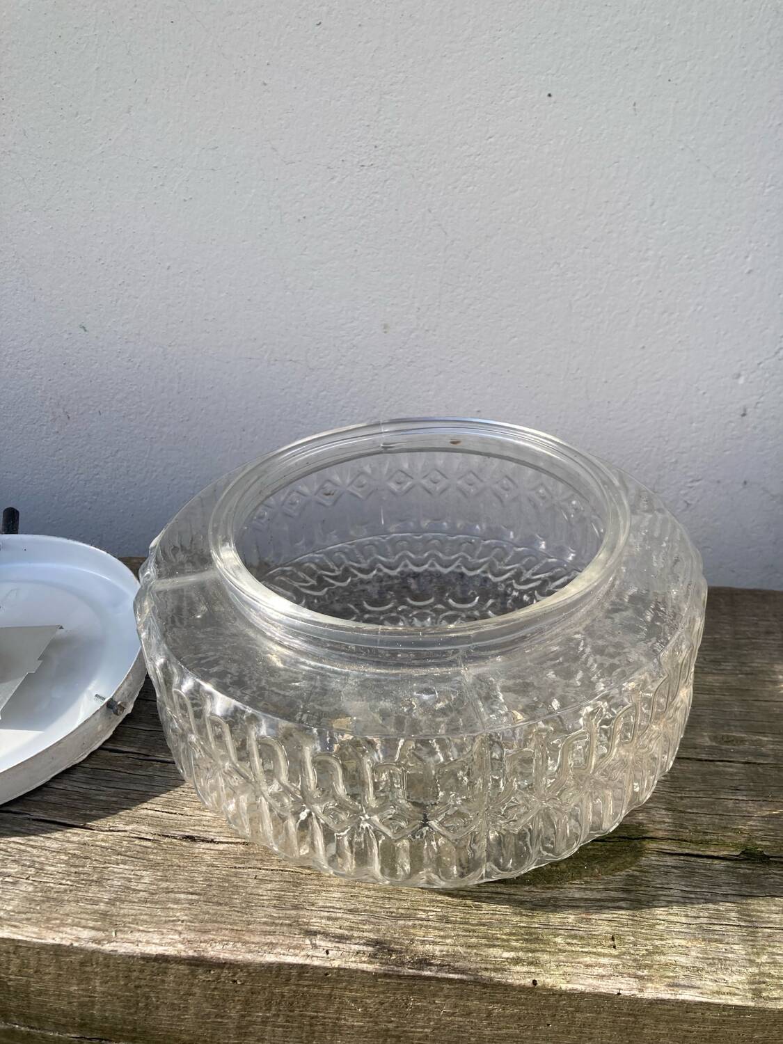 Pair of transparent round glass wall lights