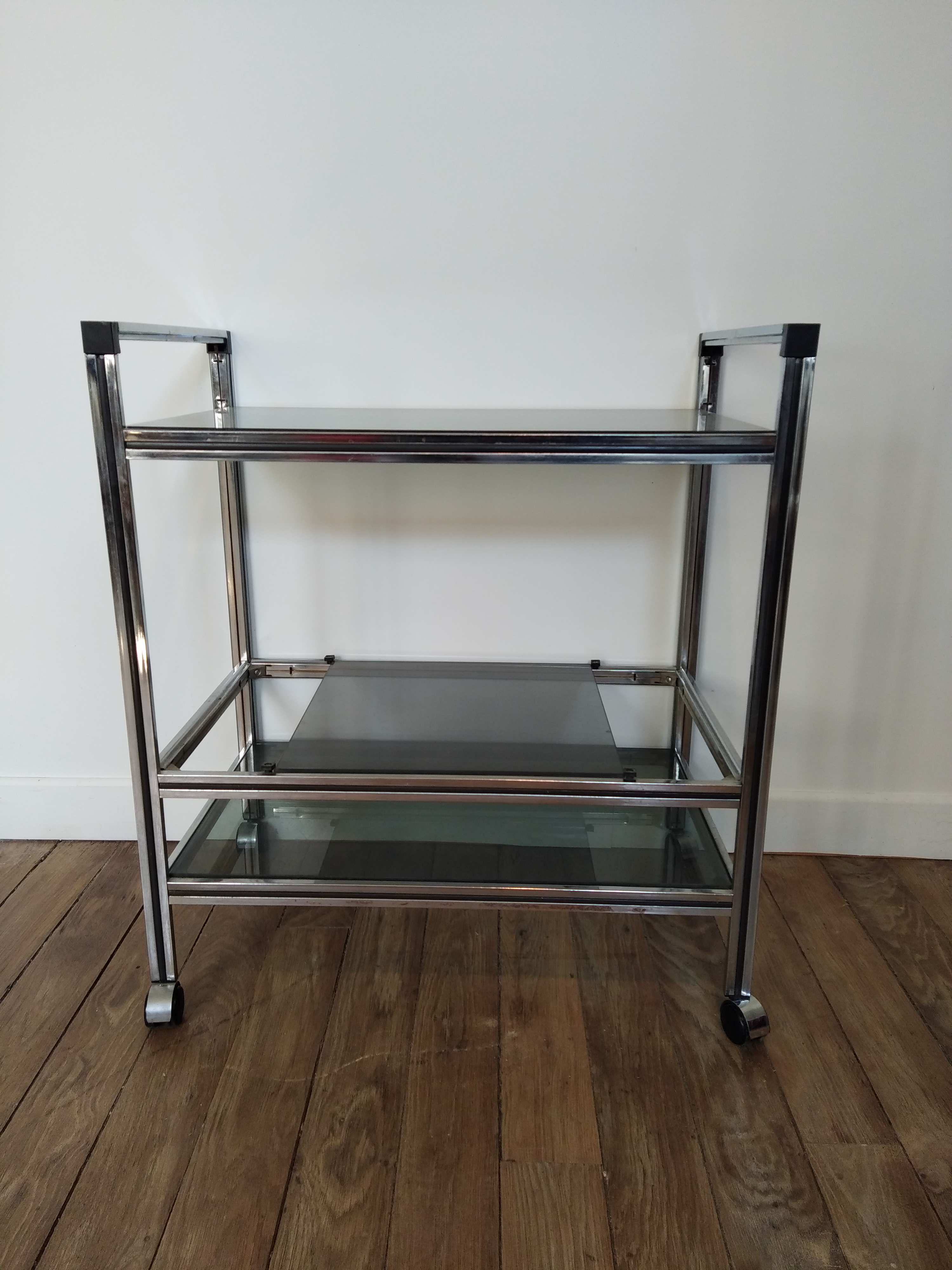 Stainless steel bar and smoked glass serving table