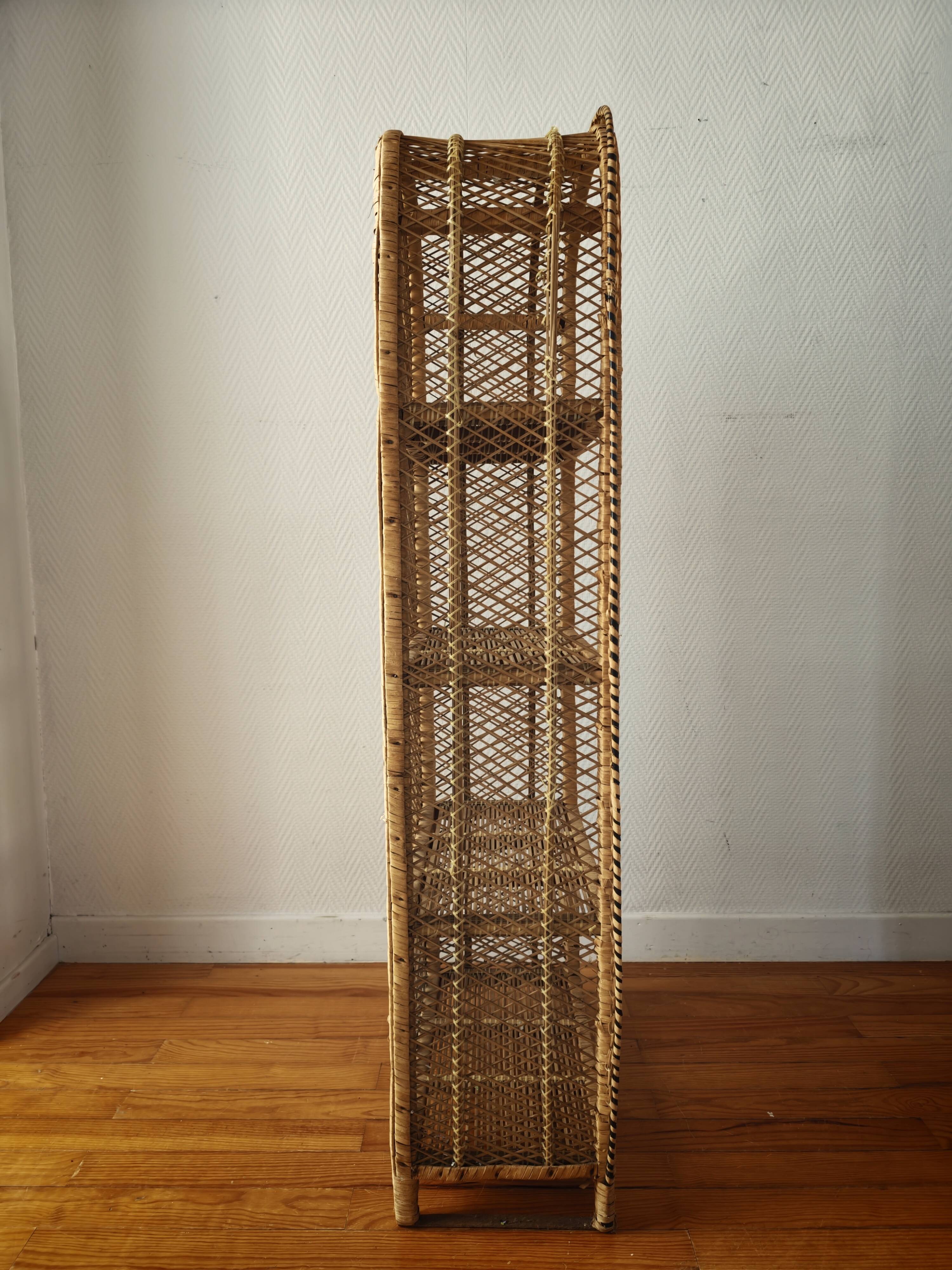 Rattan shelf on legs circa 1960