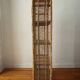 Rattan shelf on legs circa 1960
