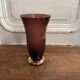 Frosted Shneider vase with pink background enhanced with golden vine leaves