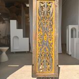 Rectangular Indonesian construction element with blue and yellow plant in carved wood