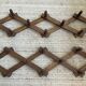 Pair of accordion coat hooks in oak from the 60s-70s.