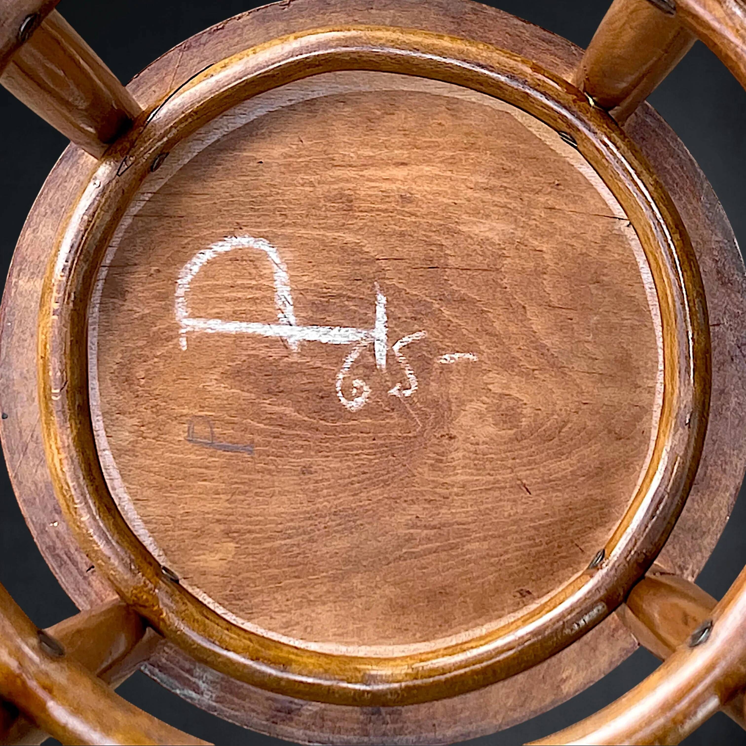 Antique high bistro stool in curved wood with a floral decorated top, Thonet style – around 1900