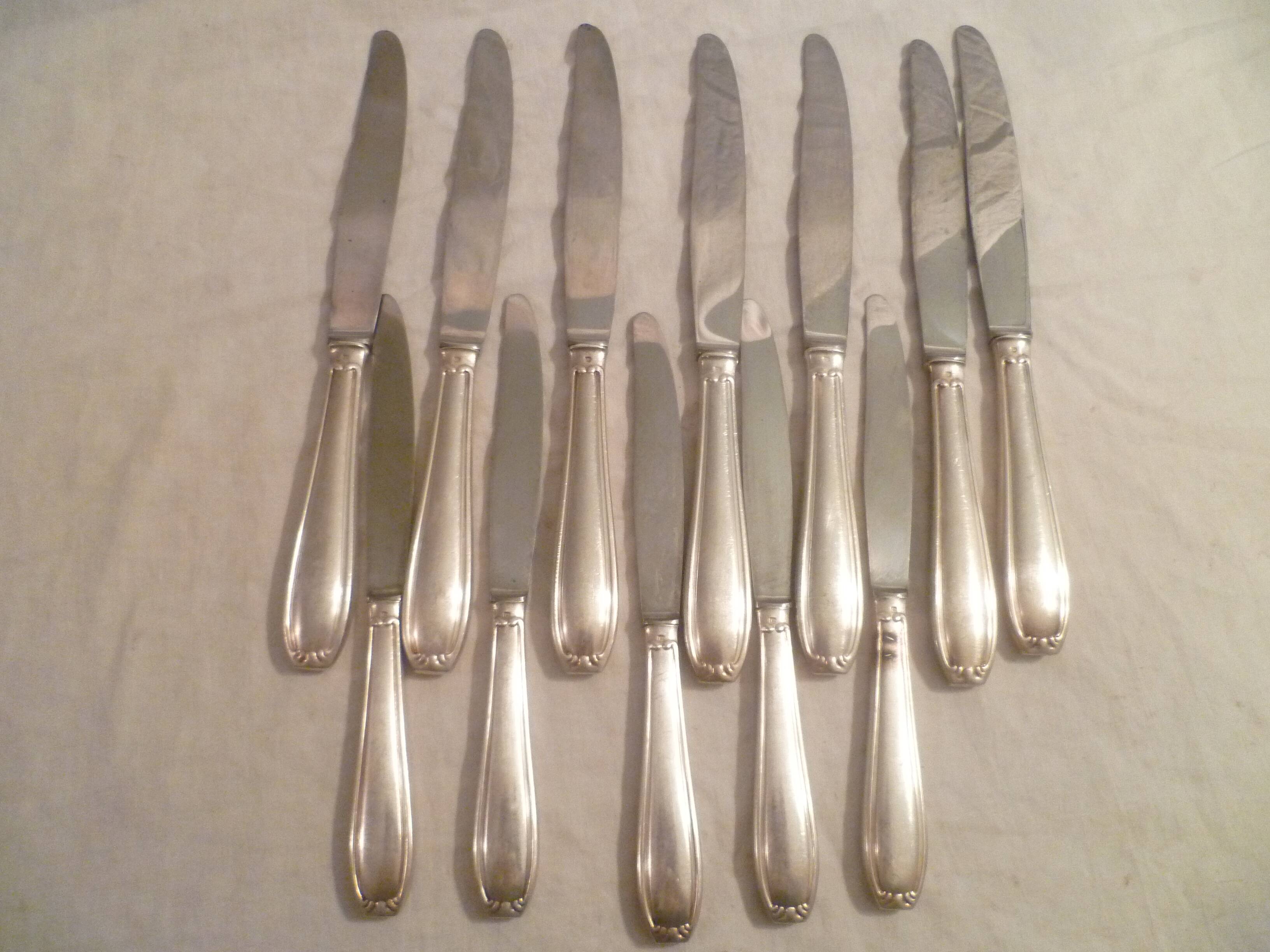 Set of 7 table knives & 5 fruit/cheese knives in silver art deco style
