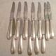 Set of 7 table knives & 5 fruit/cheese knives in silver art deco style