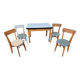 Vintage Scandinavian table and chair set with a wooden frame and formica top.