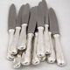 Boulenger Rambouillet 12 dessert, cheese, and fruit knives in silver-plated metal.