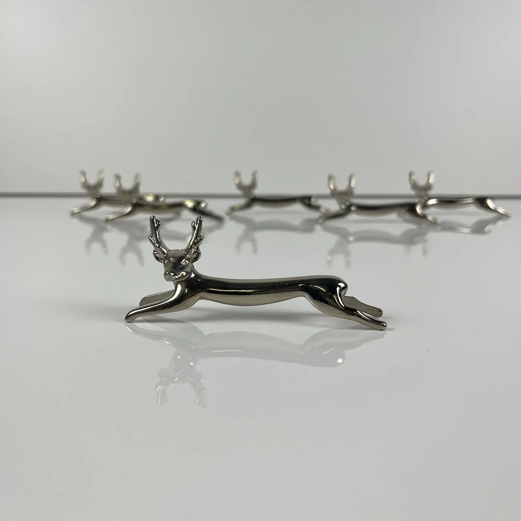 Set of 6 metal knife rests, "Deer / stag" model, 1980-90.