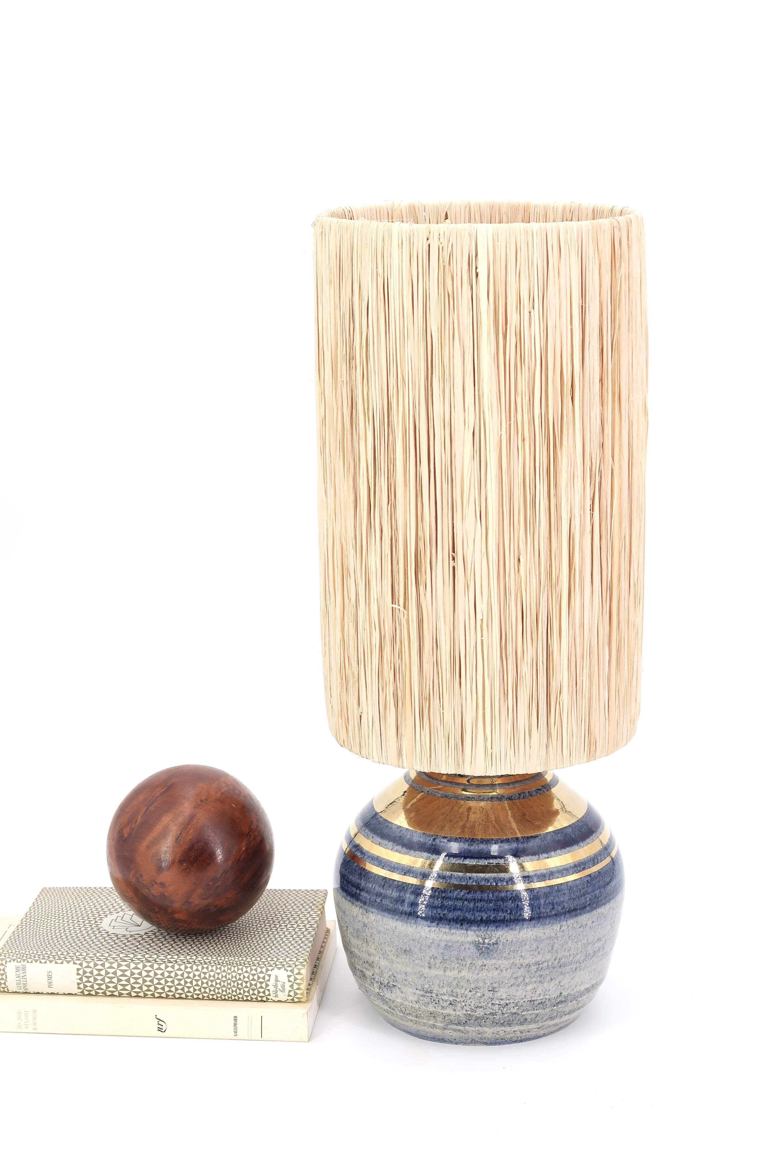 Blue and gold ceramic lamp by Georges Pelletier, raffia lampshade