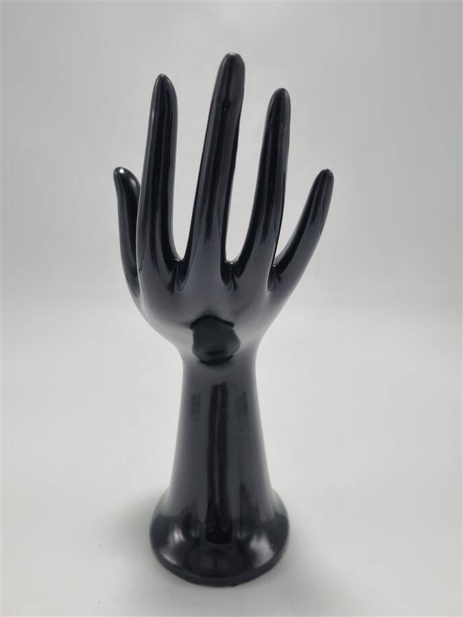Hand-shaped ring holder