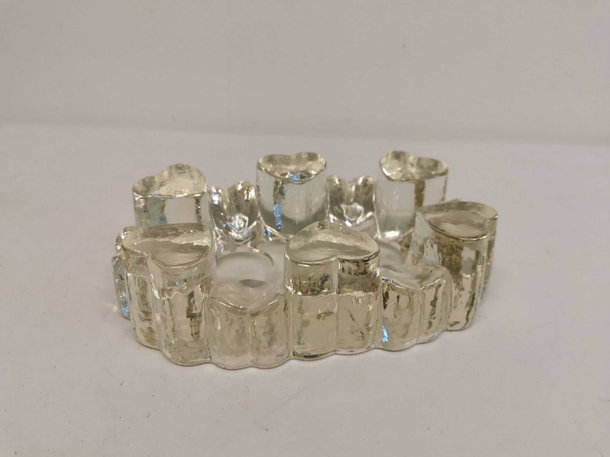 Candlestick in hard pressed glass with space for two candles