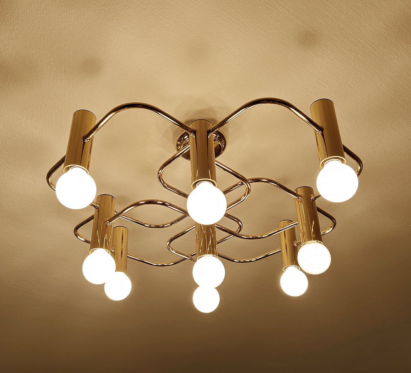 Large Space Age gilded ceiling light from Leola