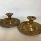 Pair of cave rat candlesticks with brass masks.