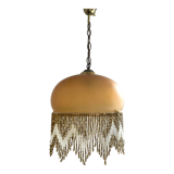 Amber polished glass and pearl suspension