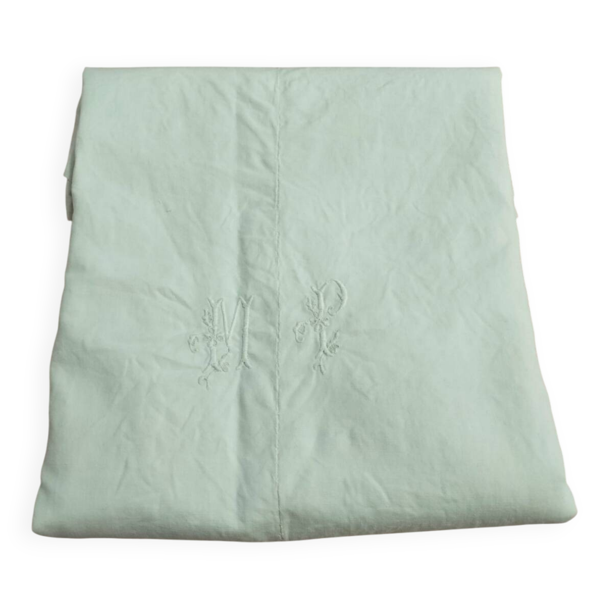 Old fabric, embroidered with the monogram MP.