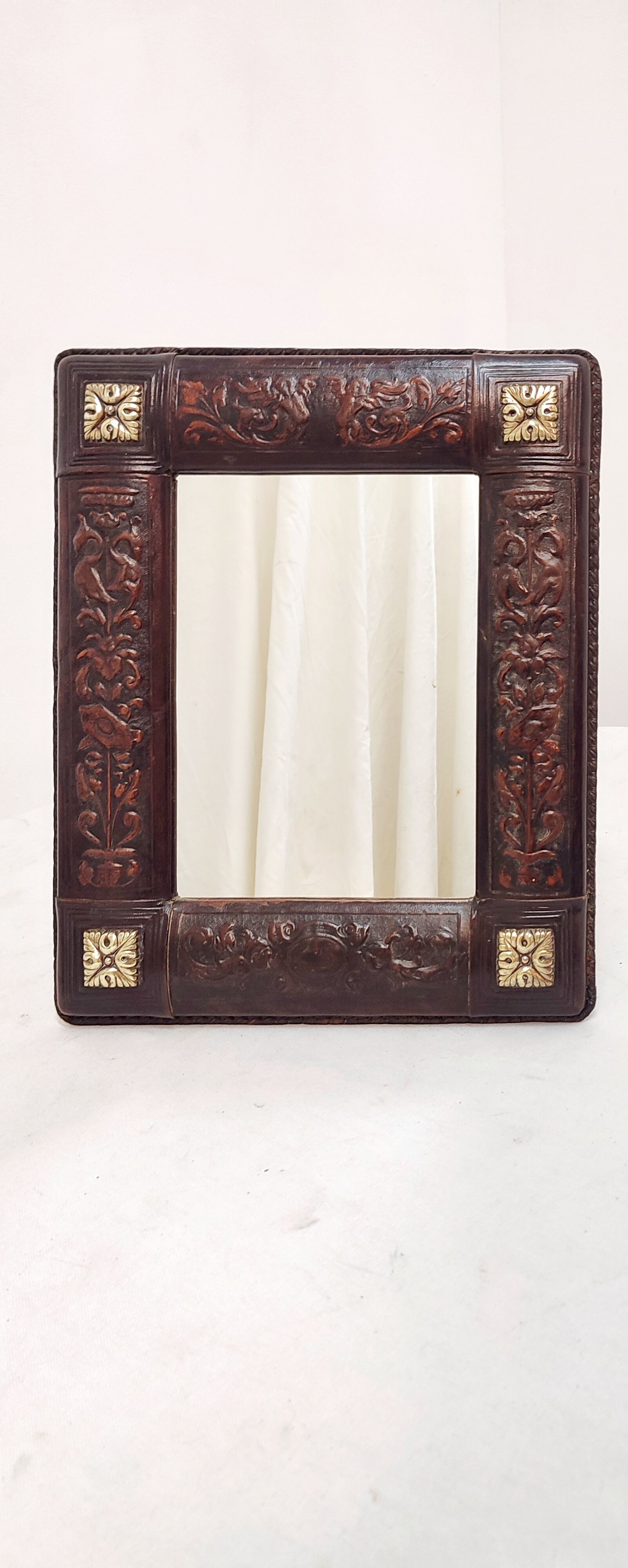 Table mirror embossed leather and bronze, Spain, 1940s