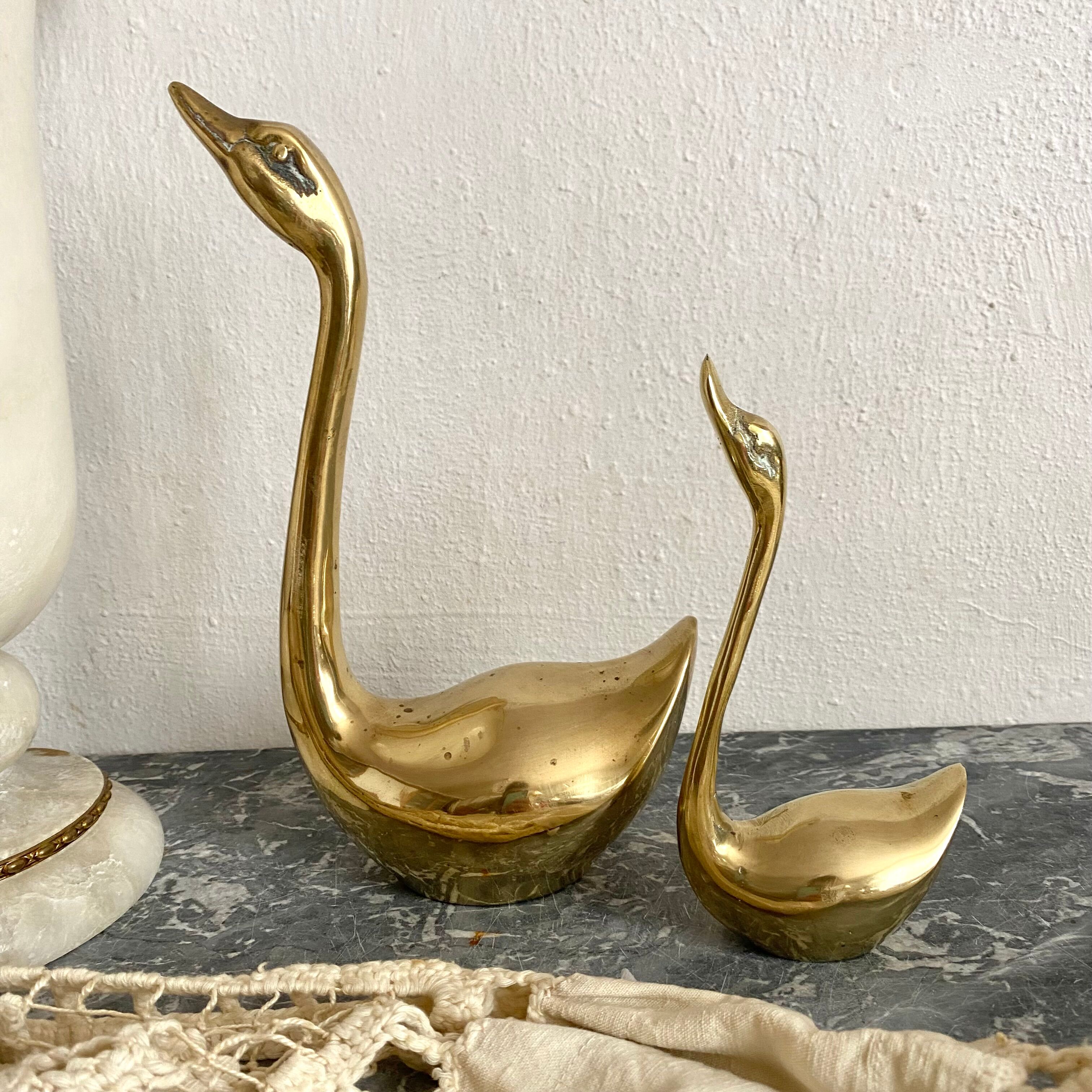 Golden brass birds