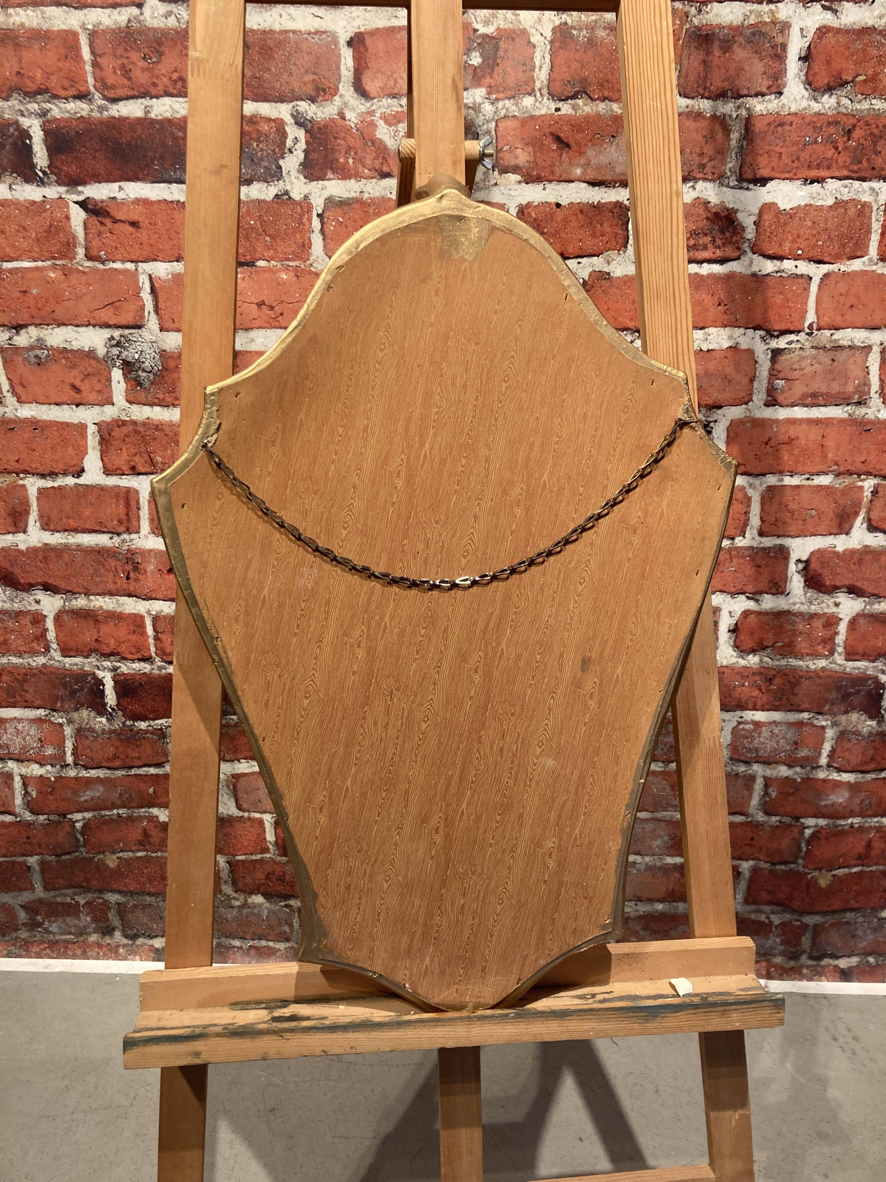 Wooden mirror painted gold