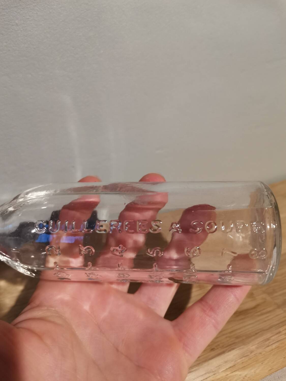 Vintage molded glass graduated apothecary pharmacy bottle