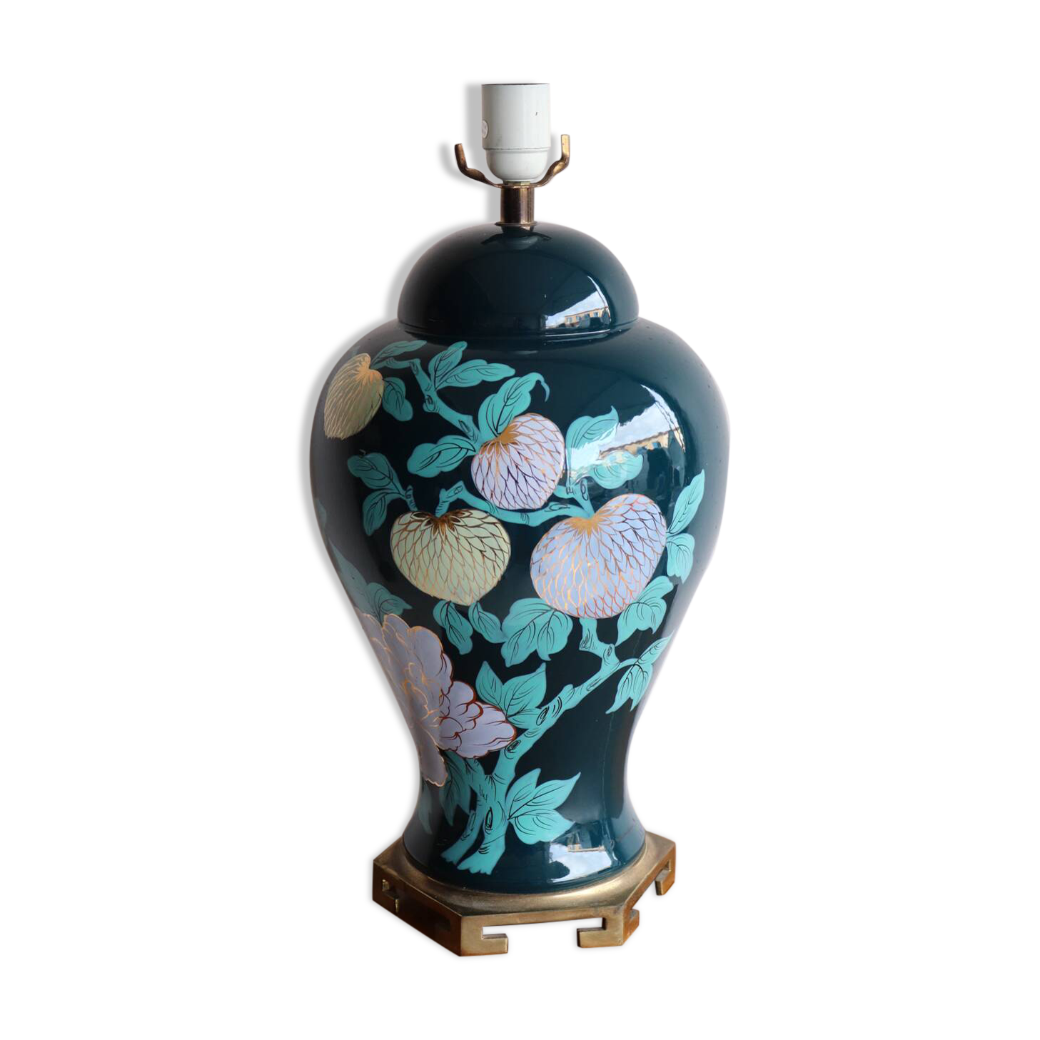 Vintage ceramic lamp with floral decoration.