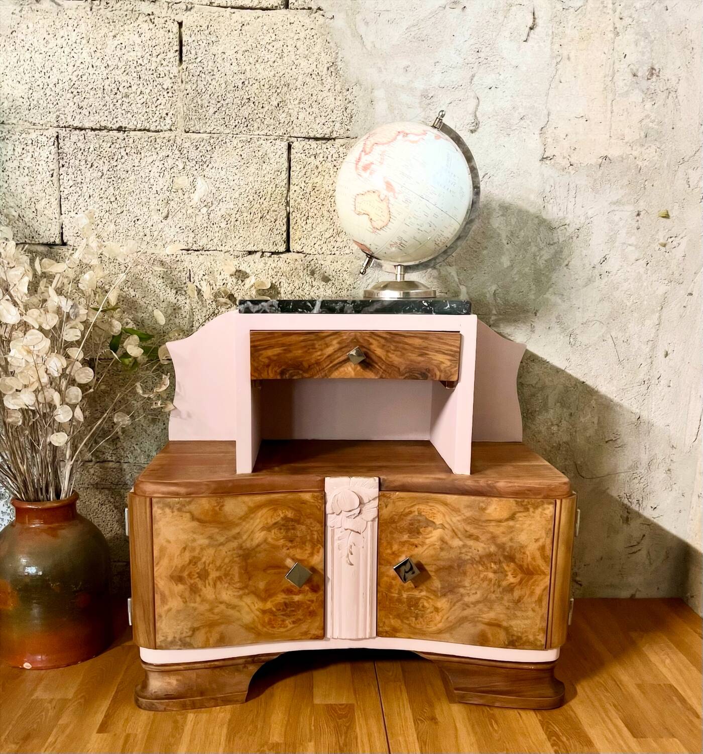 Art Deco bedside table in powder pink painted wood.