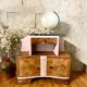 Art Deco bedside table in powder pink painted wood.