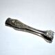 Vintage silver metal sugar or ice cube tongs with engraved lion claw decoration