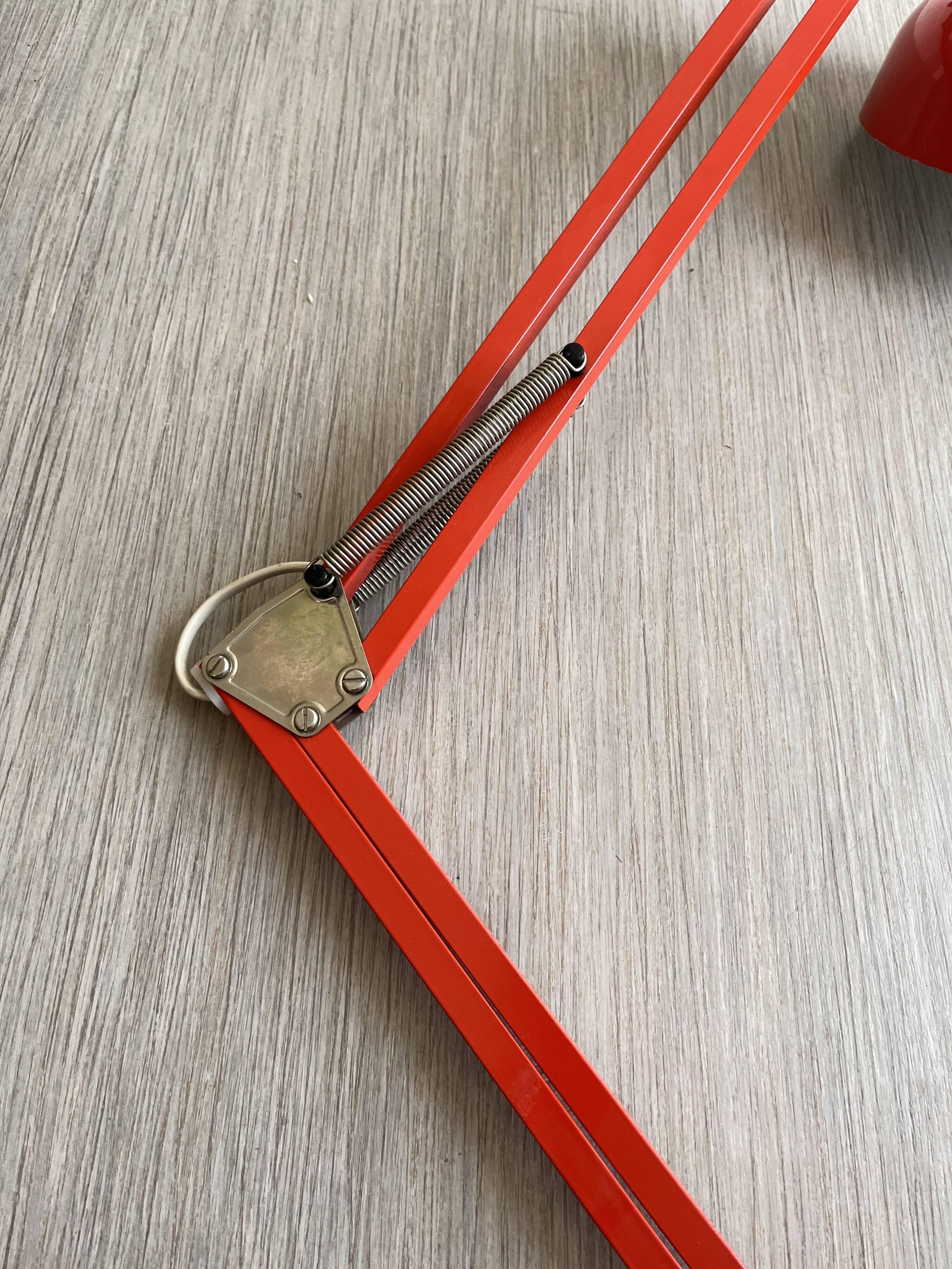 Vintage orange articulated desk lamp