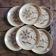 Flat stoneware plates with floral decoration – France – 1970s