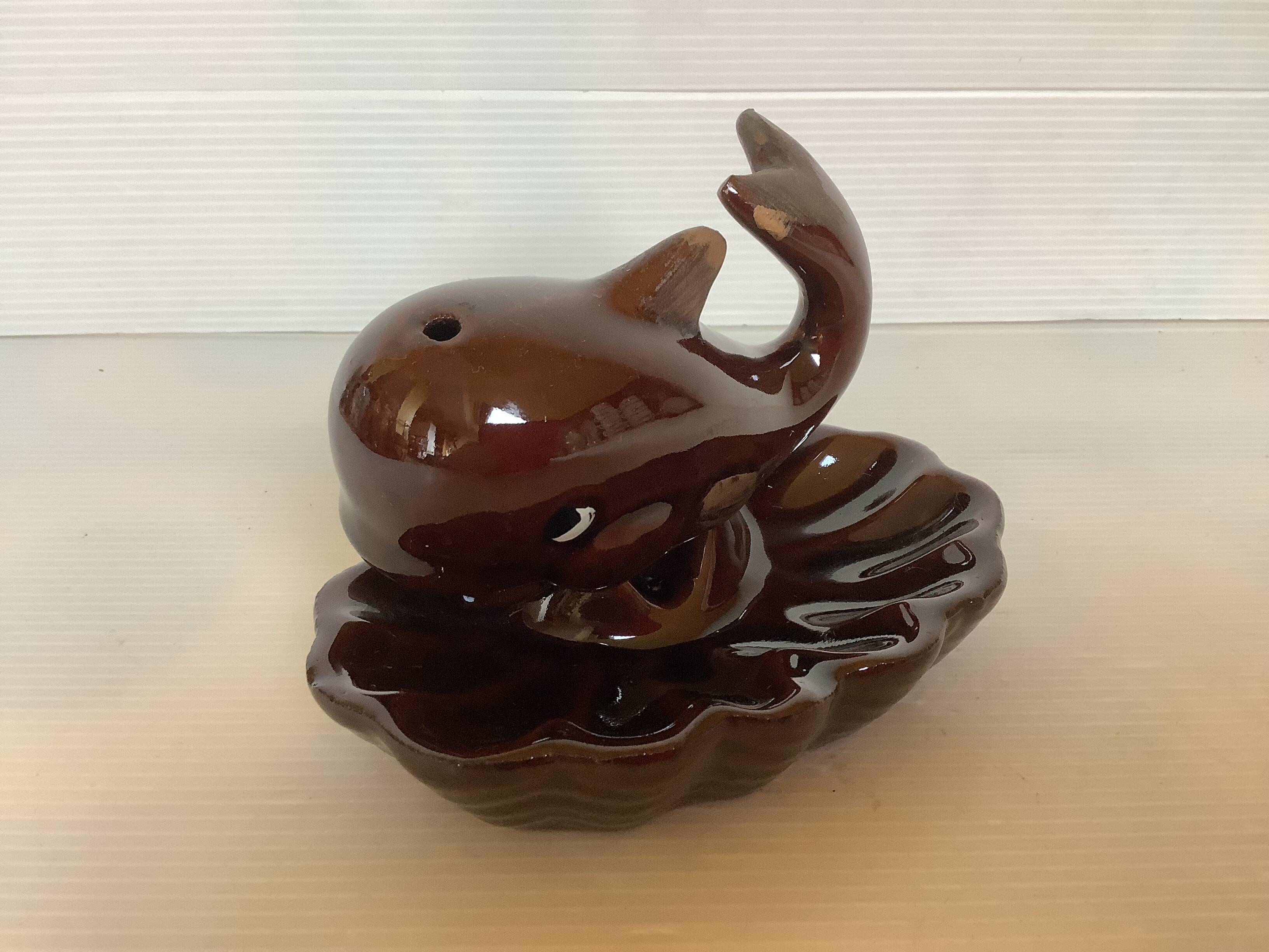 Whale-shaped pocket ashtray