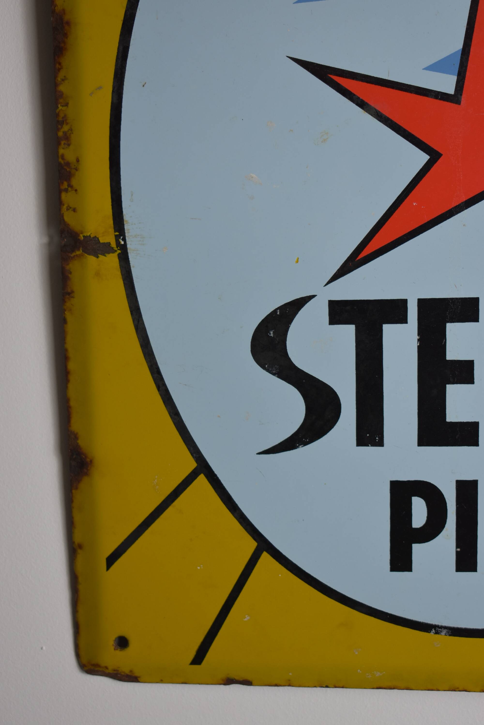 Stella Pils beer enamelled plate