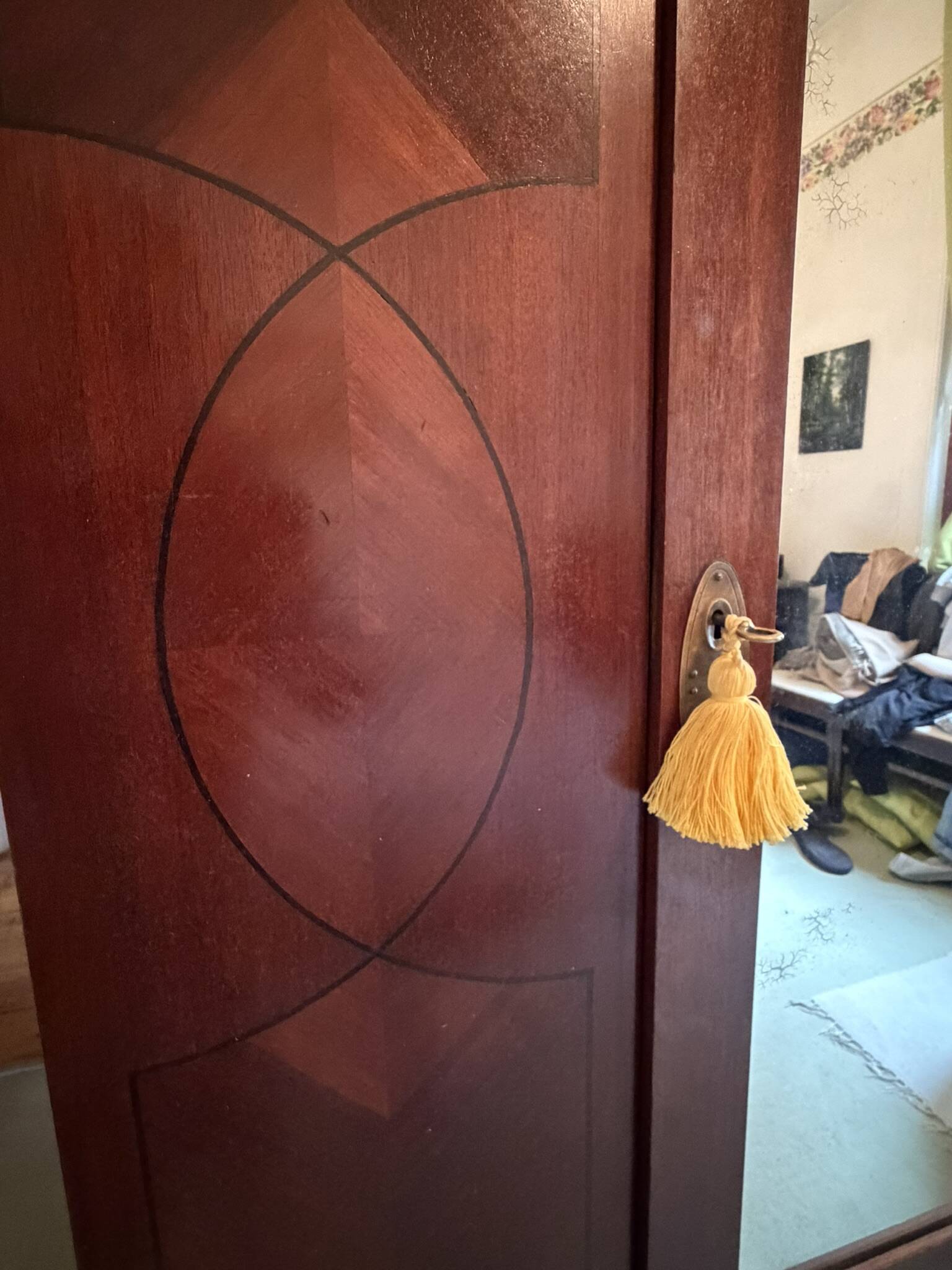Mahogany inlaid wardrobe with a mirror
