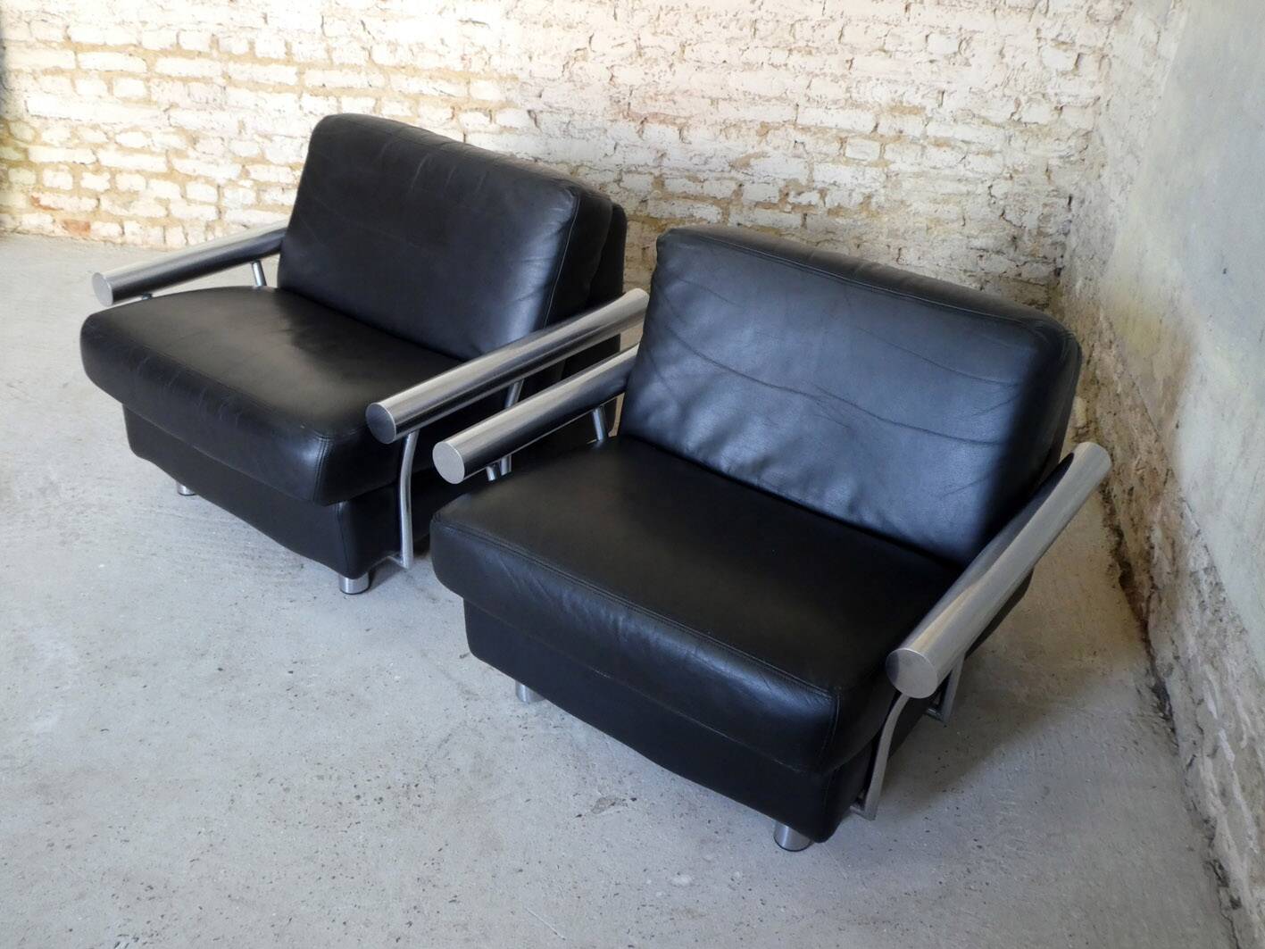 pair of armchairs, black leather & stainless steel, 1990