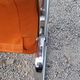 Pair of designer armchairs in orange fabrics and chrome tubes from the 70s