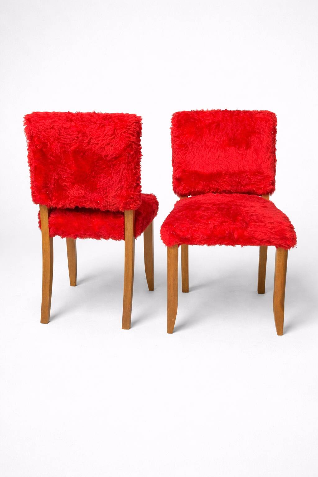 Pair of vintage wooden chairs with red fur effect upholstery – 1950