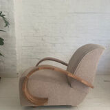Art deco armchair in walnut and curly fabric
