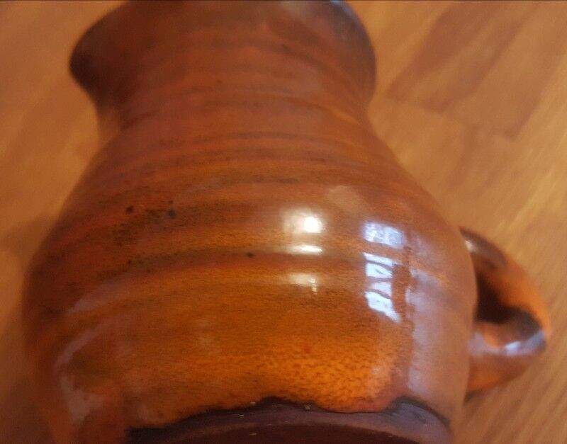 Ceramic milk pot creamer with orange glaze