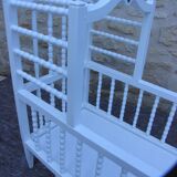 White turned wooden cradle