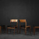Mid-century modern vintage teak and vinyl dining chairs, 1960s, set of 4.